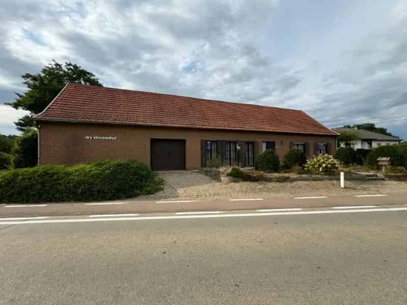 Te renoveren langgevelwoning met veel potentieel op ruim perceel in Herselt