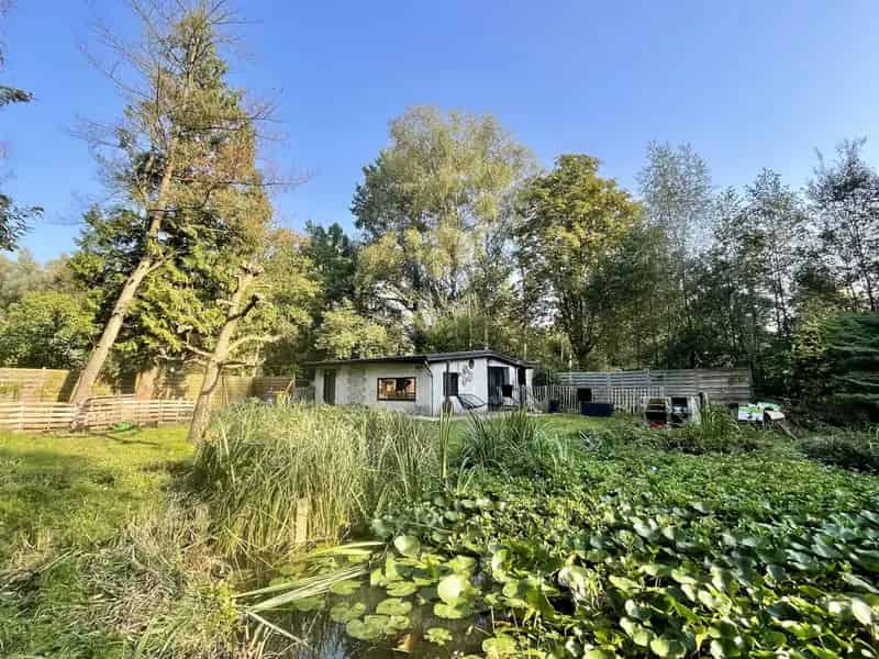 Huis te huur Herselt: Knusse Vakantiewoning met Vijver