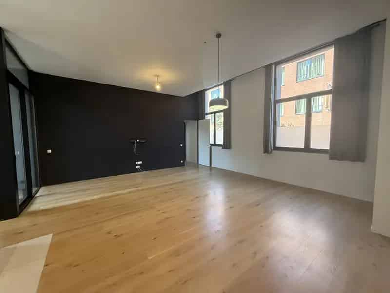AALST - CENTRUM - Lichtrijk gelijkvloers appartement met staanplaats