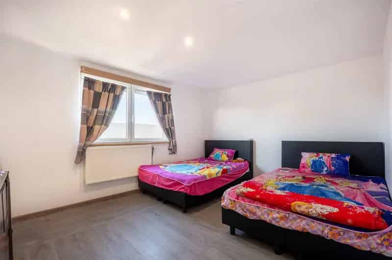 Woning met 4 slaapkamers en tuin op centrale ligging