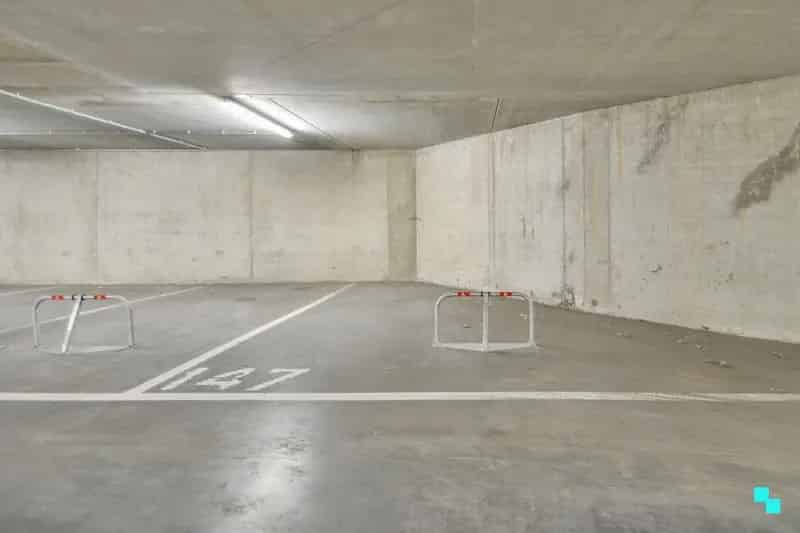 Parkeerplaats in een afgesloten parkeerkelder op een toplocatie in Merelbeke.