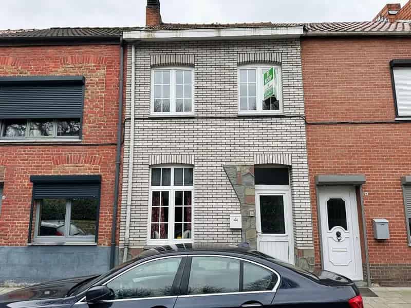 Stadswoning met  2 slaapkamers en tuin gelegen op 5 minuten van de Grote Markt