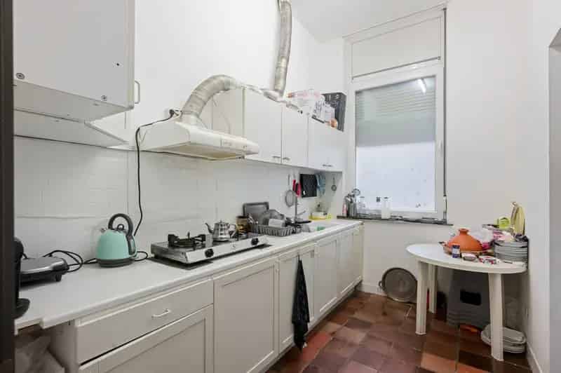 Opbrengsteigendom met gelijkvloersappartement en 6 studentenkamers
