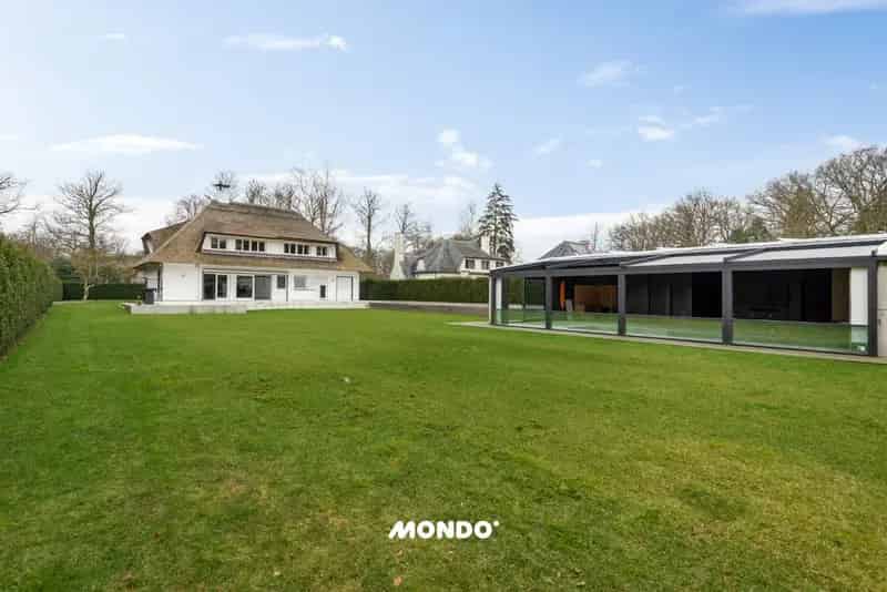 Karaktervolle villa met luxueus poolhouse, sauna en riante tuin – Toplocatie in Brasschaat