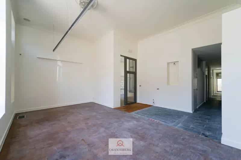 Handelspand met garage te huur nabij Gent-Sint-Pieters