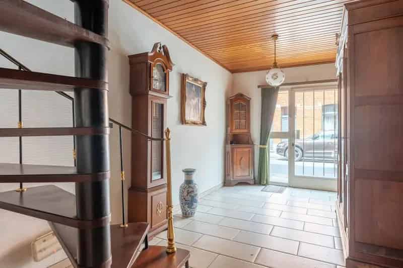 Te renoveren woning met toffe tuin en garage in het centrum