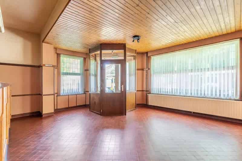 Uniek handelshuis met binnentuin en garage in hartje Diepenbeek