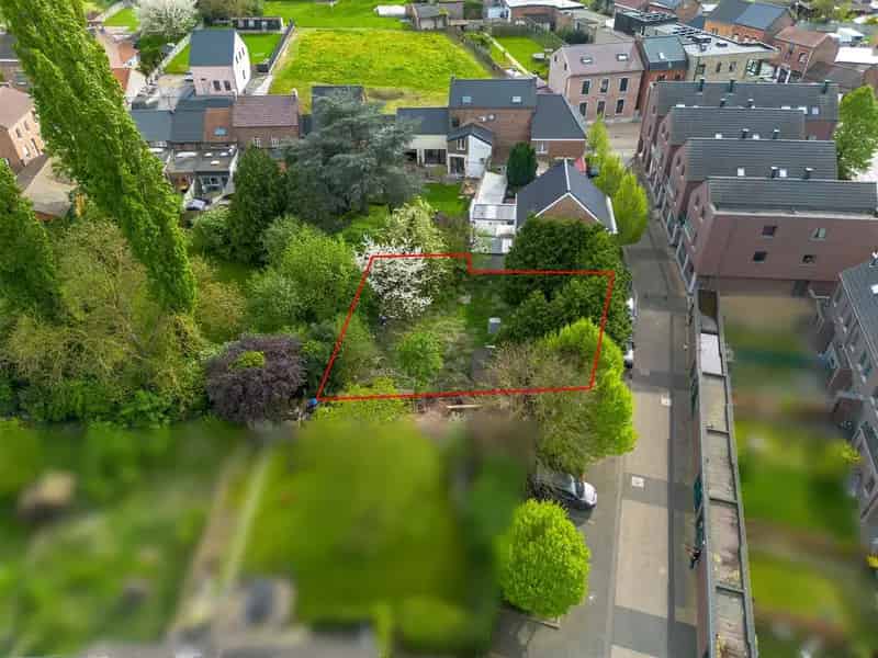 BOUWGROND GESCHIKT VOOR HALFOPEN BEBOUWING GELEGEN IN ATTENHOVEN