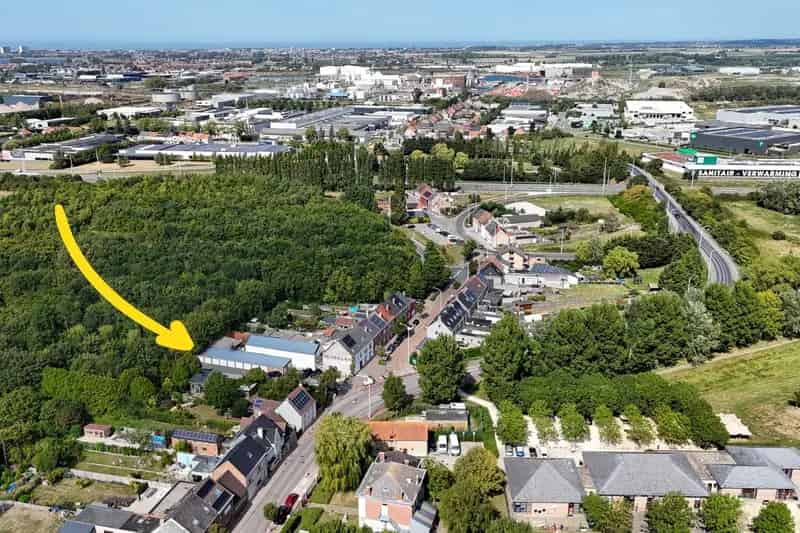 11 garageboxen als geheel te koop in centrum Zandvoorde