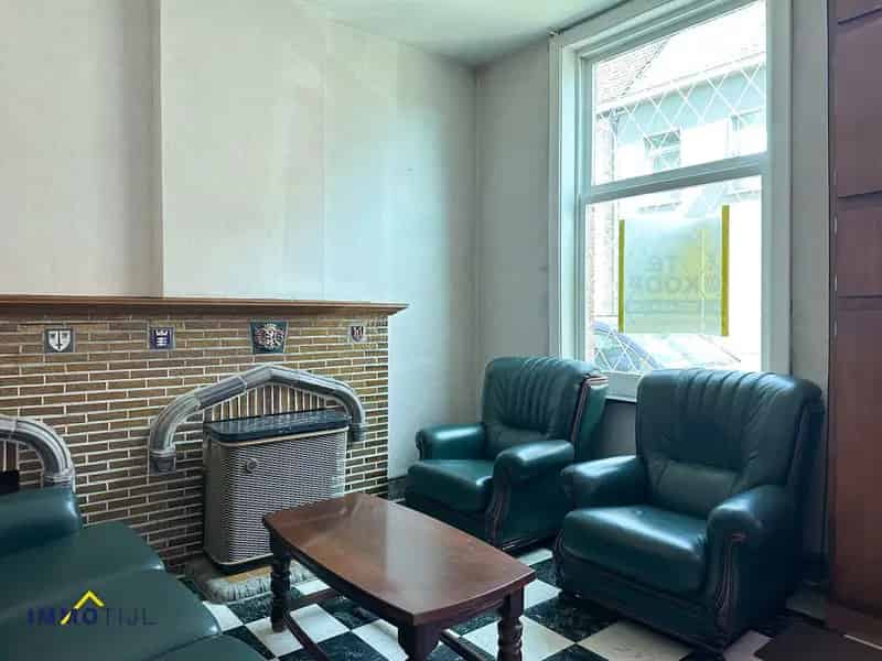 Te renoveren woning met 3 slk, garage en tuin te Hofstade