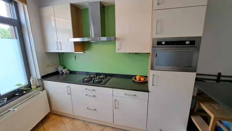 Gezellige rijwoning met 1 slaapkamer (+ bureau) en terras (2 slpks mogelijk)