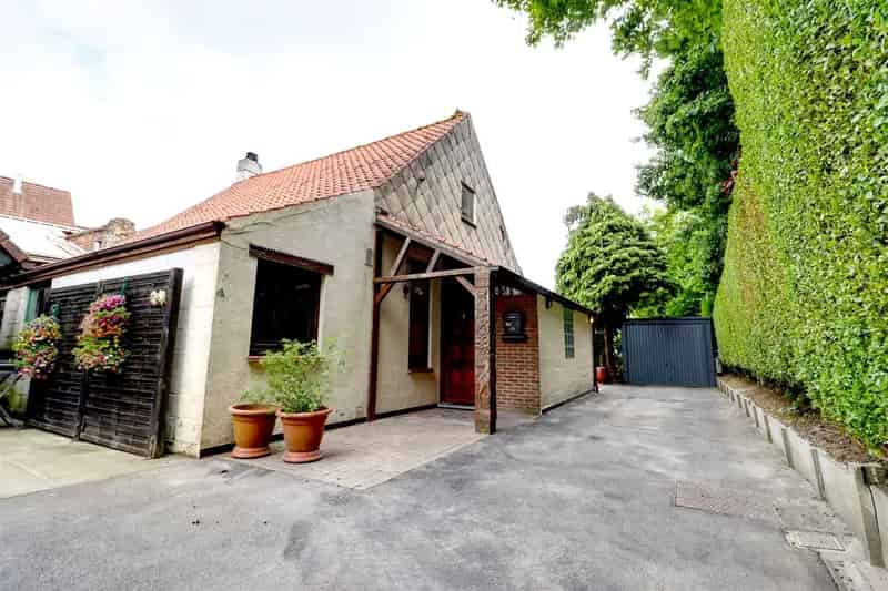Huis te koop: Gezellige familiale woning met tuin en garage