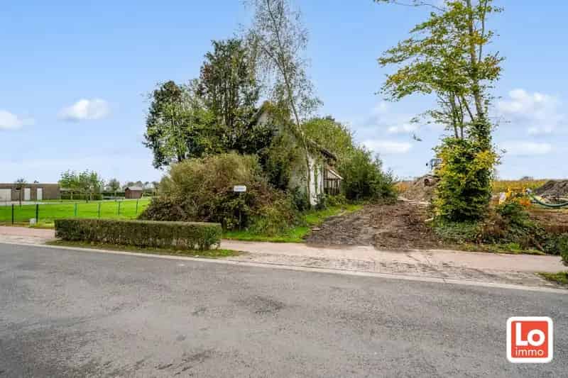 VERKOCHT! Afbraakwoning op mooi zuid georiënteerd perceel bouwgrond met open zicht in Lochristi!