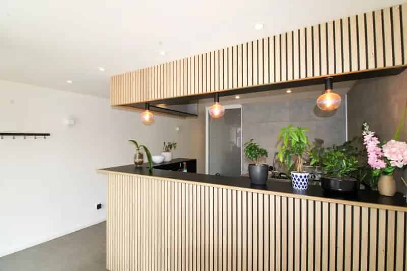 Veelzijdig handelshuis met woonst en luxueuze B&B op toplocatie aan de Markt van Temse!