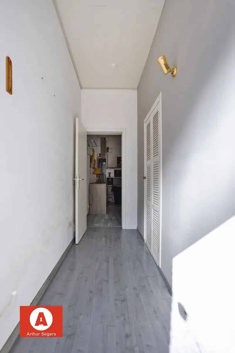 Gezinswoning met 4 slaapkamers, tuin en gerenoveerd dak.