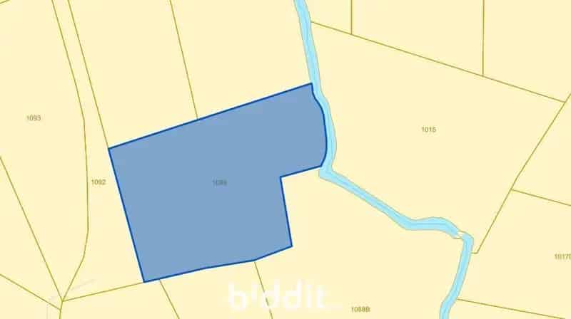Een perceel landbouwgrond te Belsele (palend aan een ander)