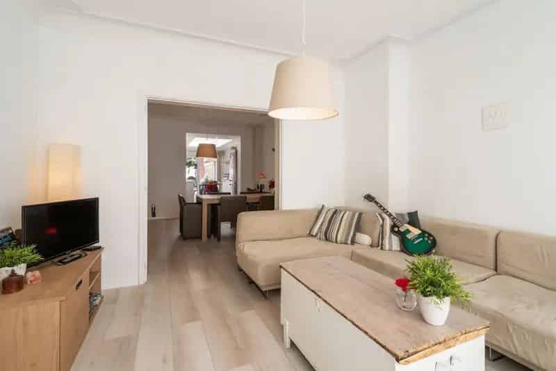 Instapklare woning met zonnige tuin te koop in Zwijnaarde