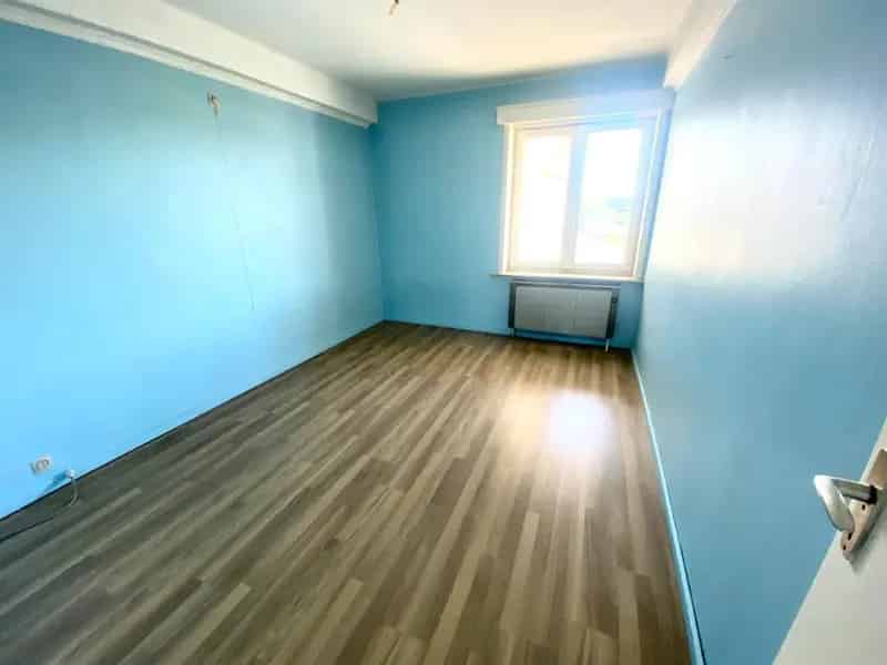 Ruim appartement met twee slaapkamers en garage te Aalst