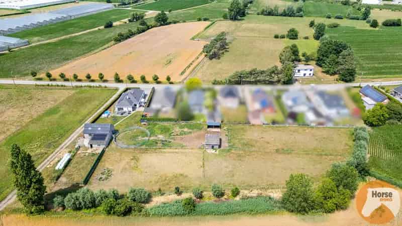 LOCHRISTI - Open bebouwing met stalgebouw en weides