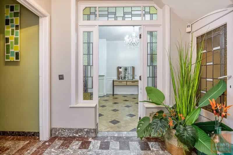 Gezellige woning (half open) met heerlijke Zuid  tuin