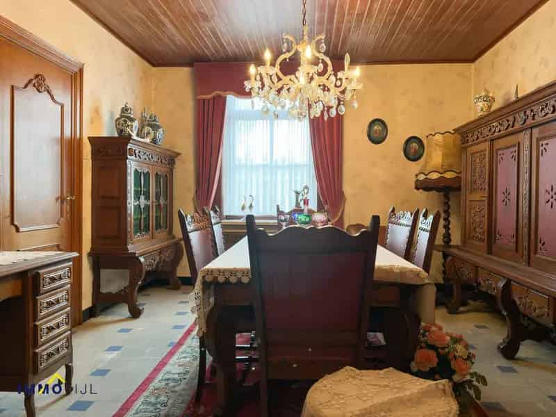 Woning met potentieel op ruim perceel grond!