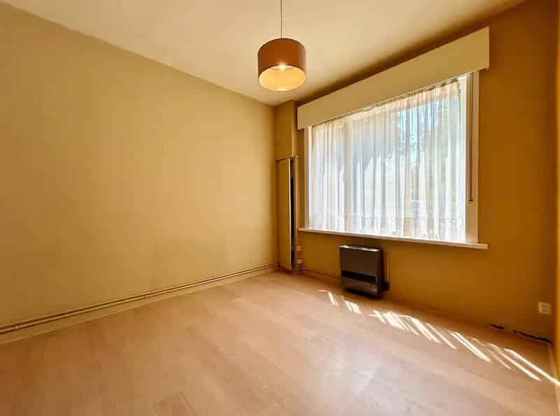 Huis te koop Boezinge: Ruime Rijwoning met Garage en Tuin