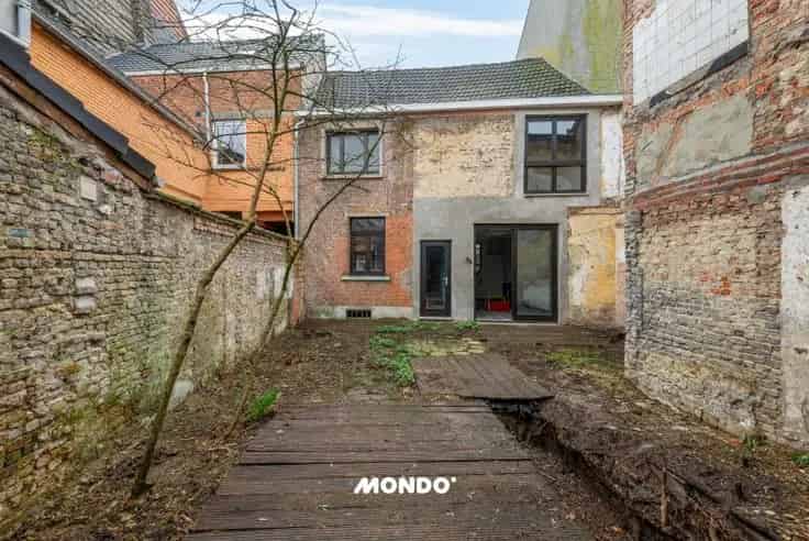 Huis Te Koop Niel Centrum: Renovatieproject met Tuin