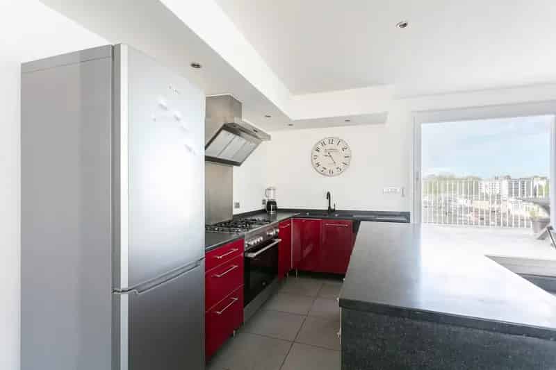 Riant dakappartement met 2 slpk, terras (50m²) & 2 autostnpl
