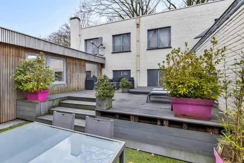 Huis met Loods Magazijn Appartement te Assebroek