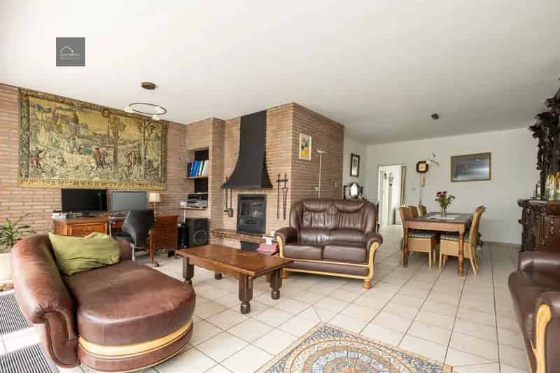 Halfopen bebouwing met tuin en atelier