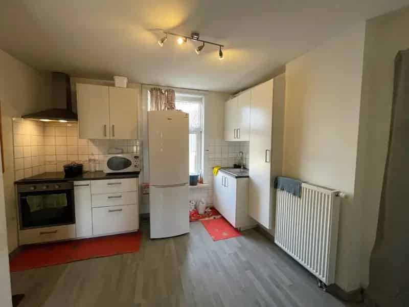 Geheel van 2 woningen in het centrum van Herent - ideale investering