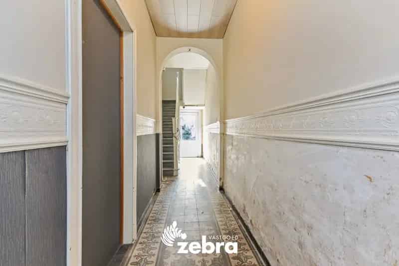 Te renoveren woning met stadskoer in centrum Tielt