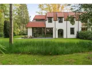 Appartement te koop Waasmunster - Villa-appartement met tuin en garage