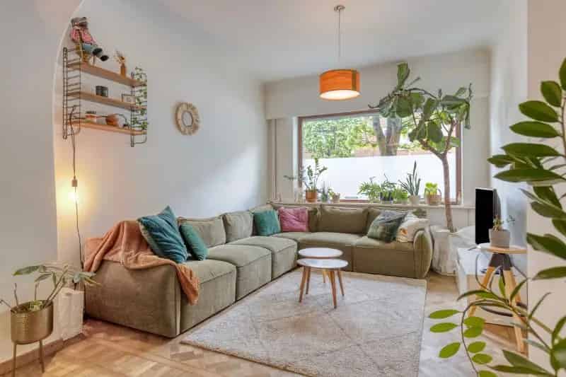 Zonnige woning met tuintje en topligging