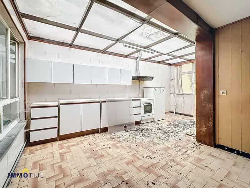 Uitstekend gelegen woning met tuin te Erembodegem!