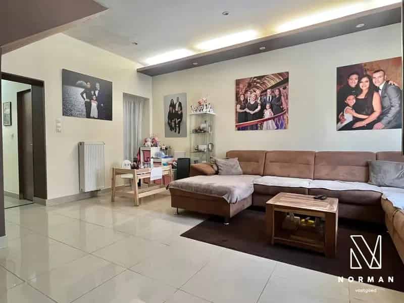 Halfopen woning te koop met handelsruimte in Harelbeke!
