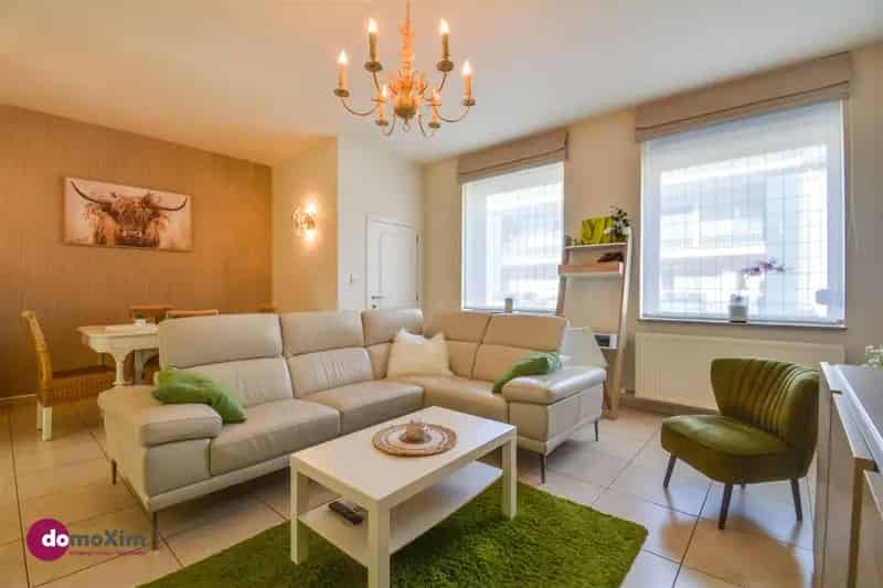 Gezellige rijwoning met 2 slaapkamers en garage in centrum Rijmenam