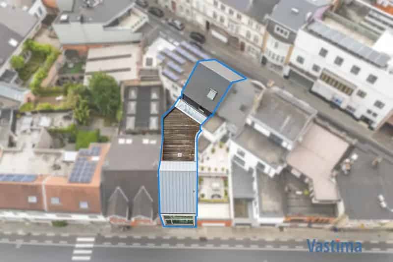 Unieke investeringskans: handelspand met woongelegenheid in hartje Aalst