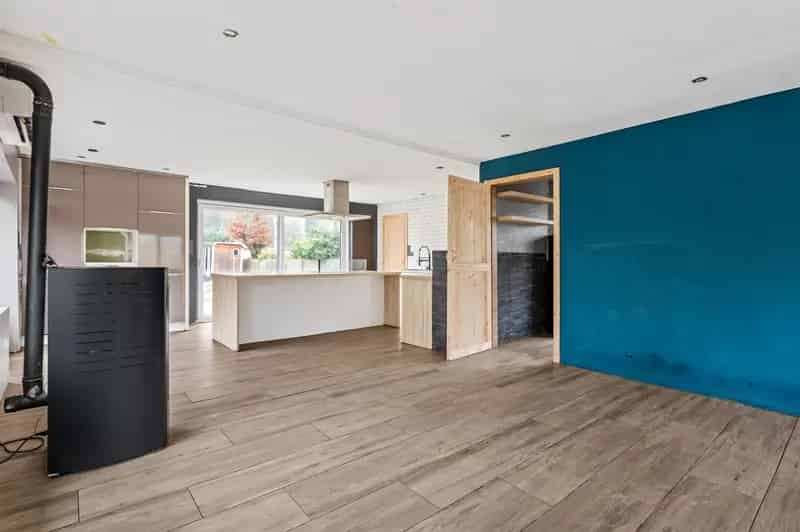 Open bebouwing met 3 slpks, garage en tuin in een groene omgeving te Brecht