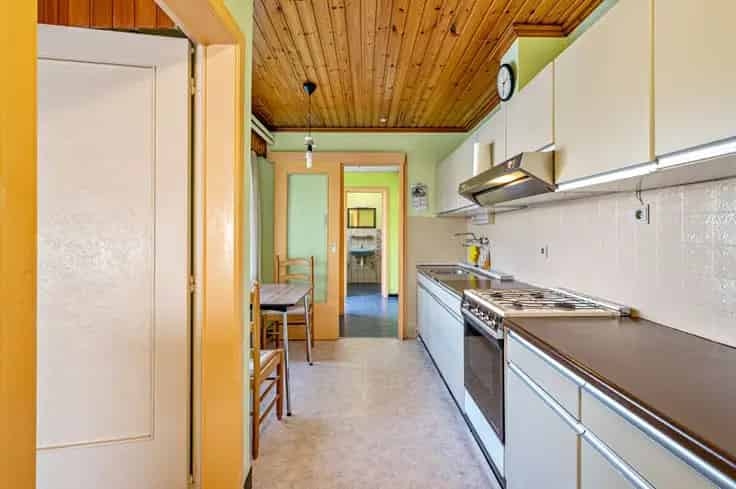 Huis Te Koop Evergem: Ruime HOB met Tuin en Garage