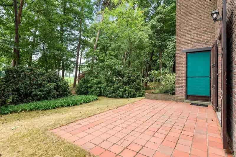 Charmante woning met grote tuin, rustig en groen gelegen op een perceel van 2.193m² in het woonbos te Essen