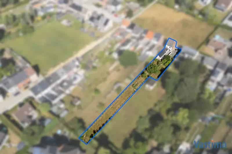 Renovatiewoning met aanpalende bouwgrond nabij centrum Erembodegem