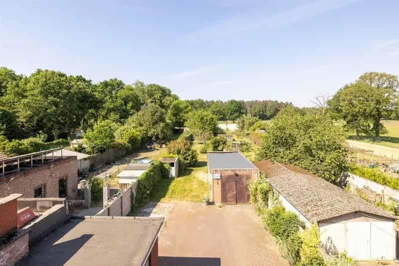 Deels gerenoveerde 4slpk woning op 9a 58ca