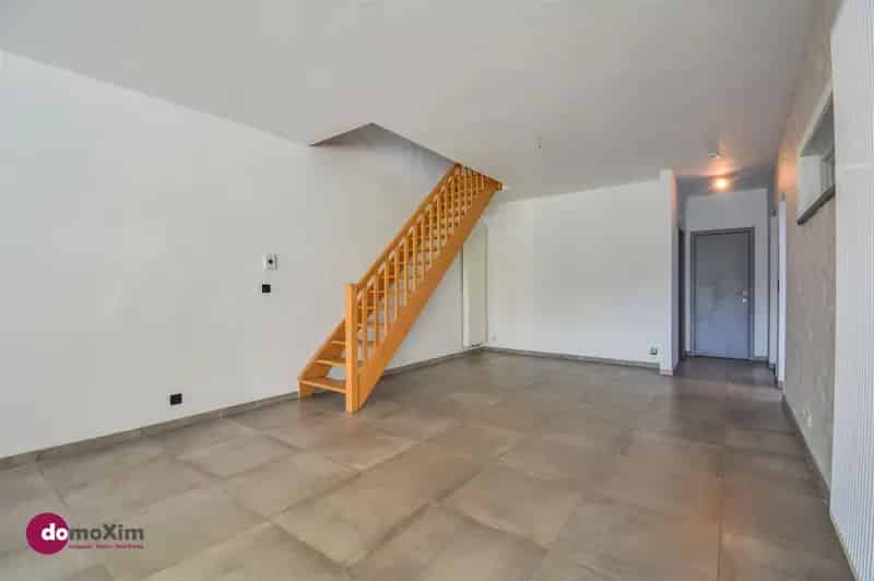 Centraal gelegen, ruime woning met tuin, garage én potentieel