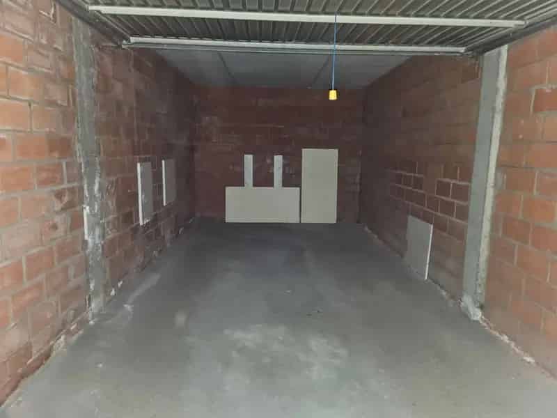 Afgesloten garagebox te koop in hartje Brugge: Muntplein.