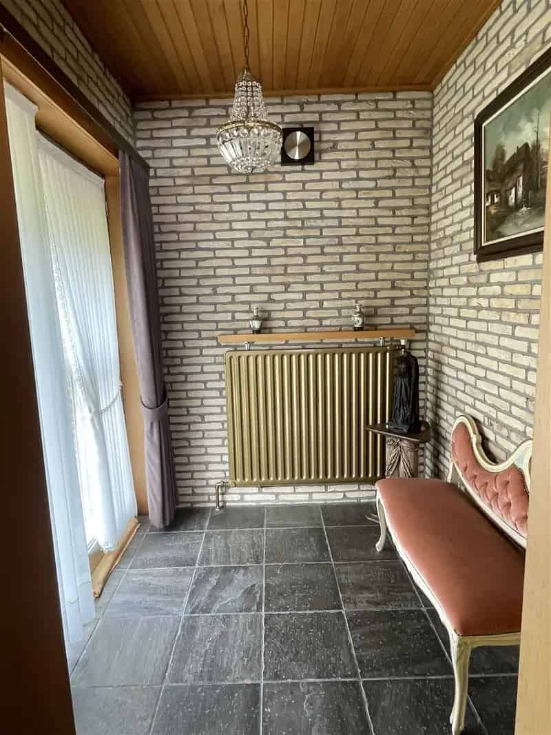 Huis met 3 slaapkamers, garage en tuin