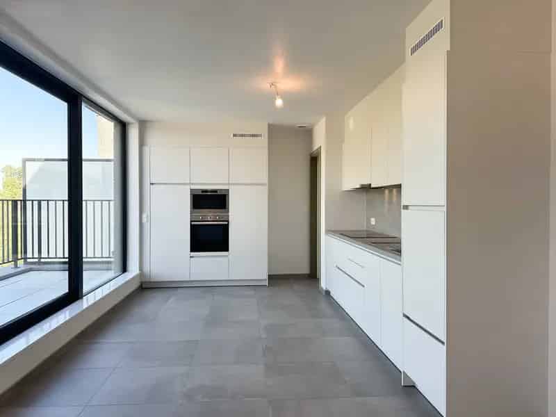 Knap app met 2 slpk, terras en staanplaats te Erembodegem!