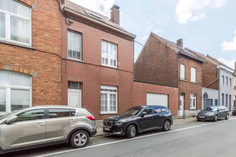 WONING MET GROTE GARAGE/BOUWGROND !