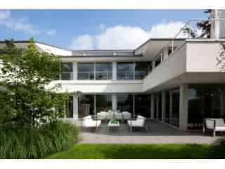 Huis te koop Dessel - Luxe villa aan privé meer met zwembad