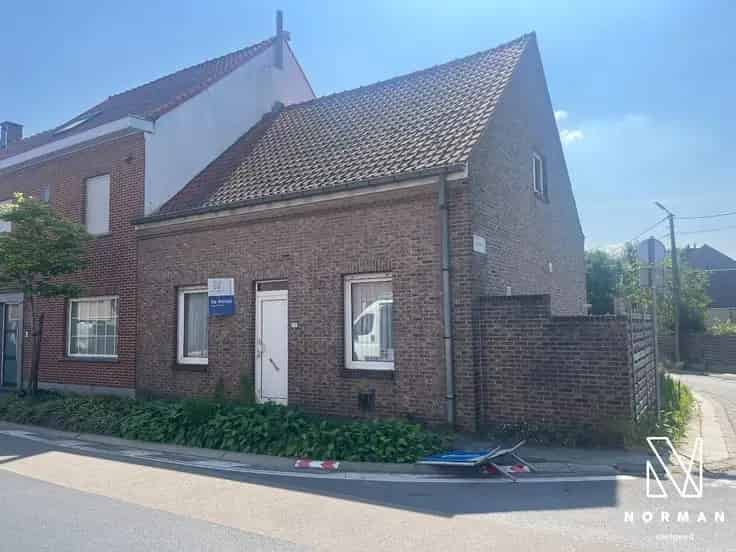 Huis Te Koop: Gerenoveerde woning met atelier garage en tuin